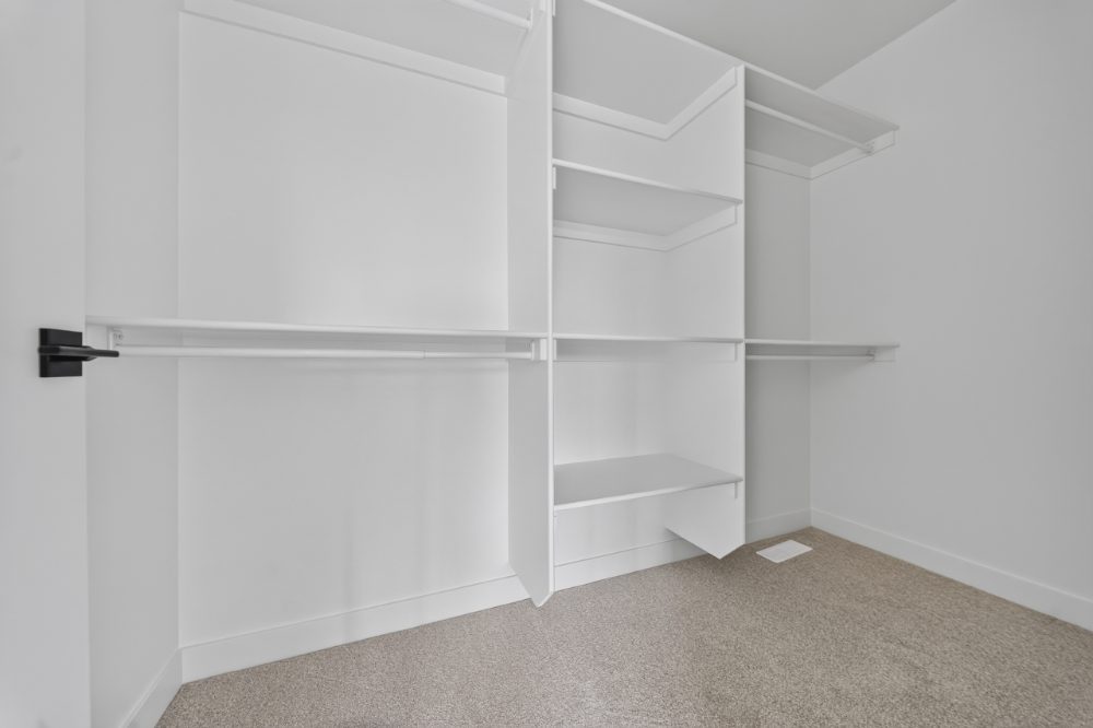 Walk-in closet with built-in shelving